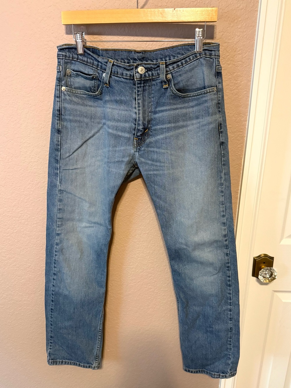 Levi's Classic Slim Straight Blue Denim Jeans.